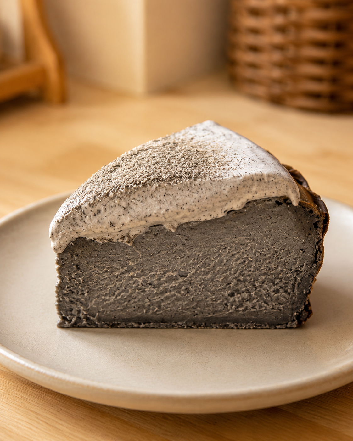 Close-up of a creamy slice of Black Sesame Basque